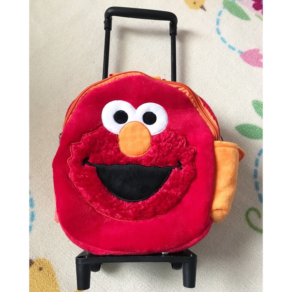 Toddler Elmo rolling suitcase/backpack